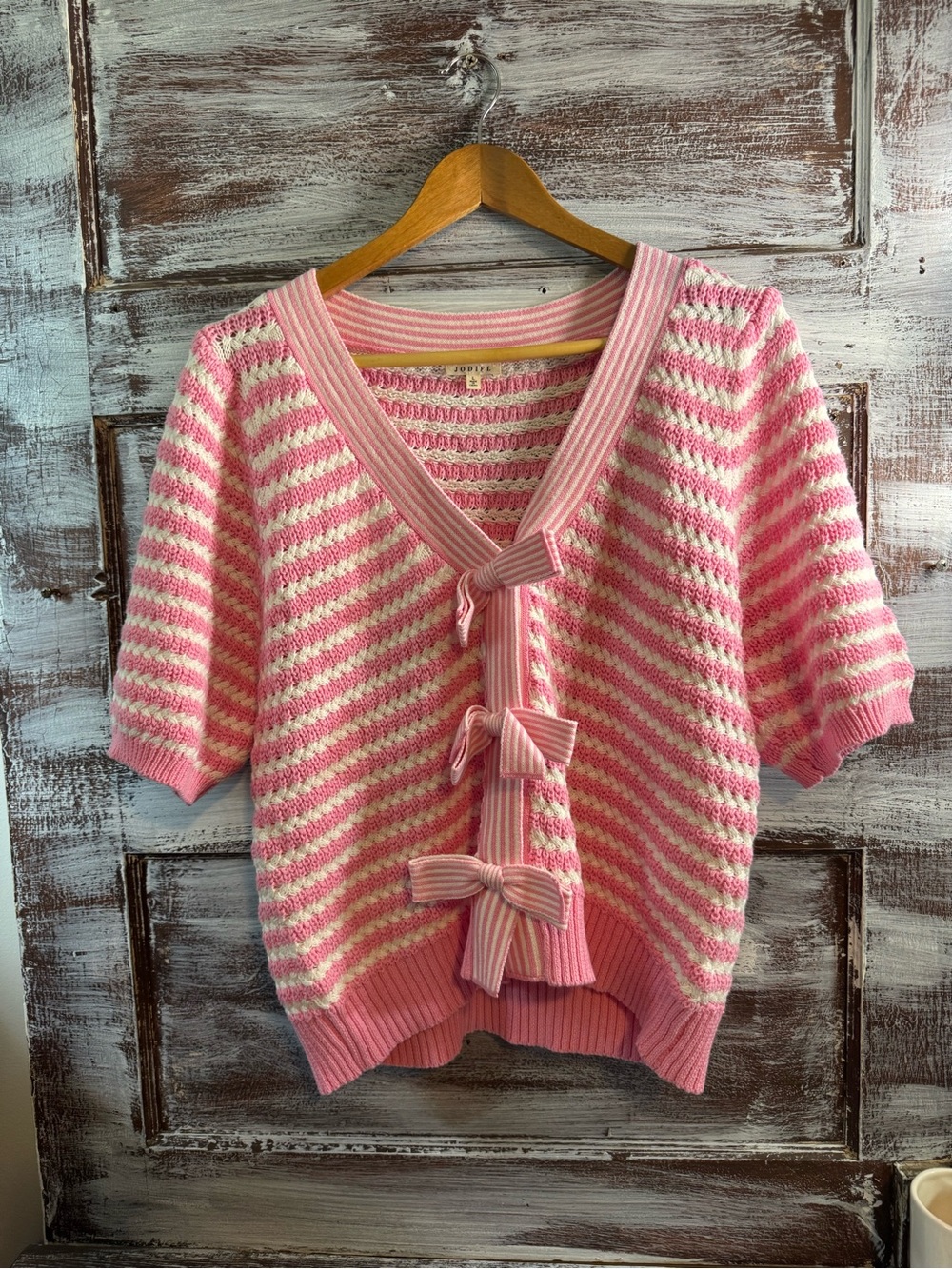 JODIFL Pink and Cream Striped V-Neck Sweater with Bow Details